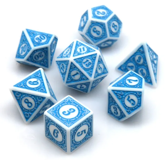 Set of blue and white polyhedral dice on a white background
