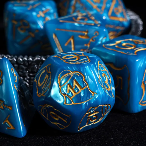 Blue dice with gold numbering and symbols on a black background