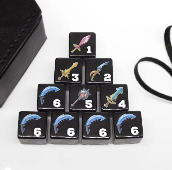 Set of dice with sword designs on a white surface