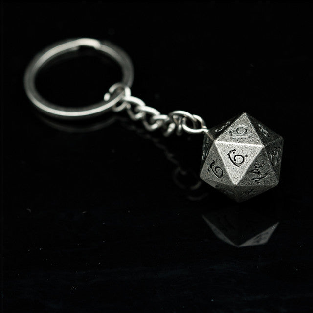 D20 polyhedral dice keychain on a black background