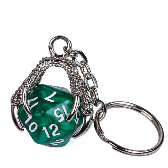 Green polyhedral die keychain with silver metalwork on a white background