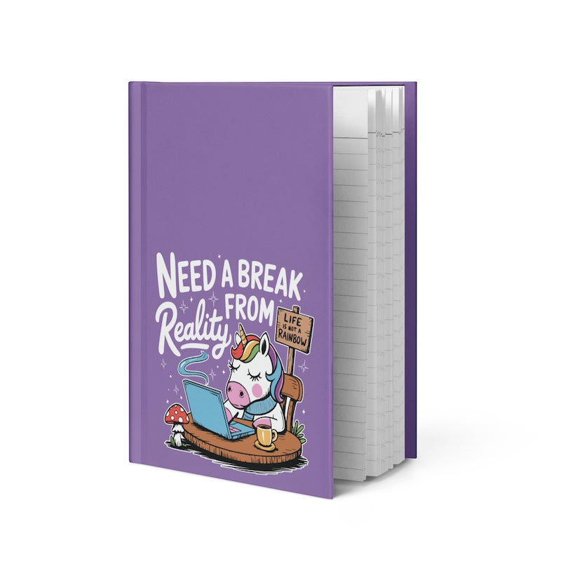 Purple notebook with a cartoon unicorn and text on a white background