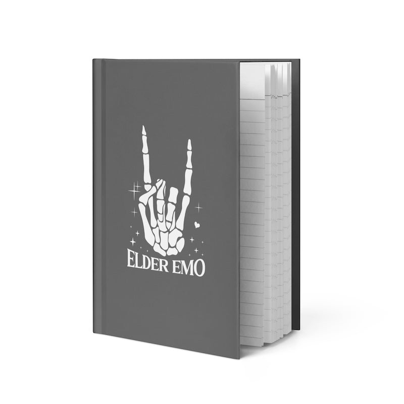 Gray notebook with a skeleton hand and 'Elder Emo' text on a white background