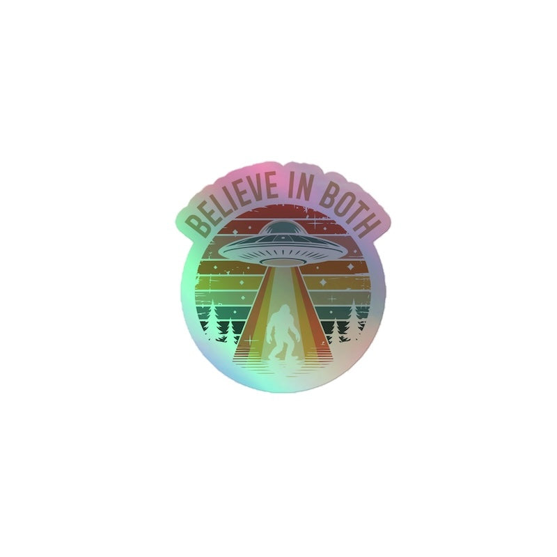 Holographic sticker with UFO and text 'BELIEVE IN BOTH' on a white background
