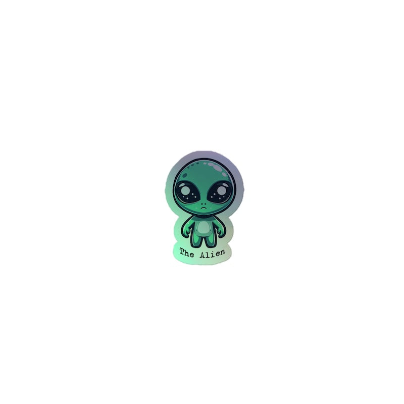 Small green alien figurine with a white background