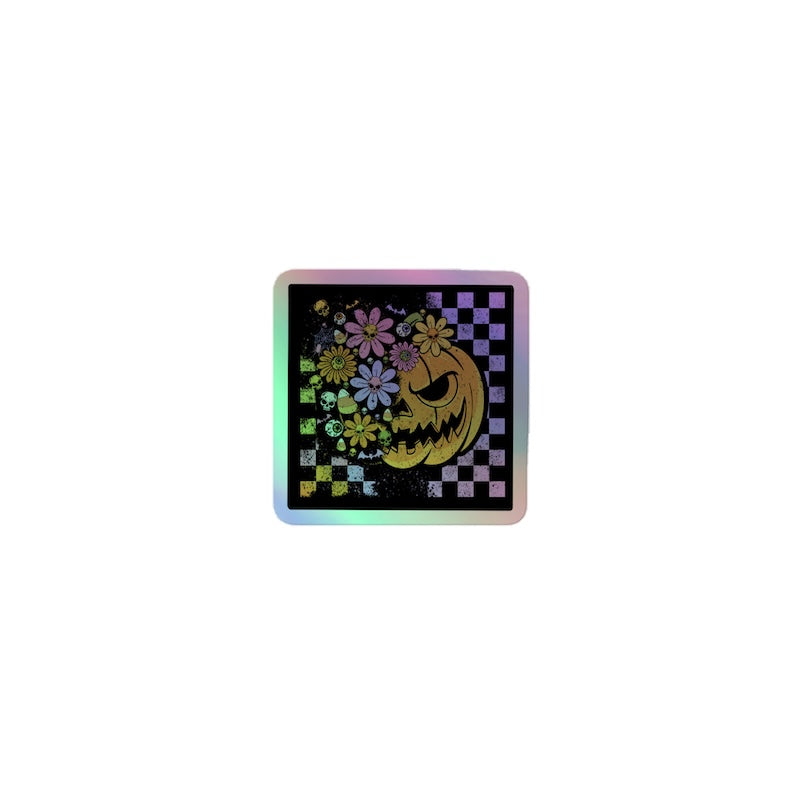 Decorative coaster with a Halloween-themed design featuring a jack-o'-lantern and flowers on a checkered background.