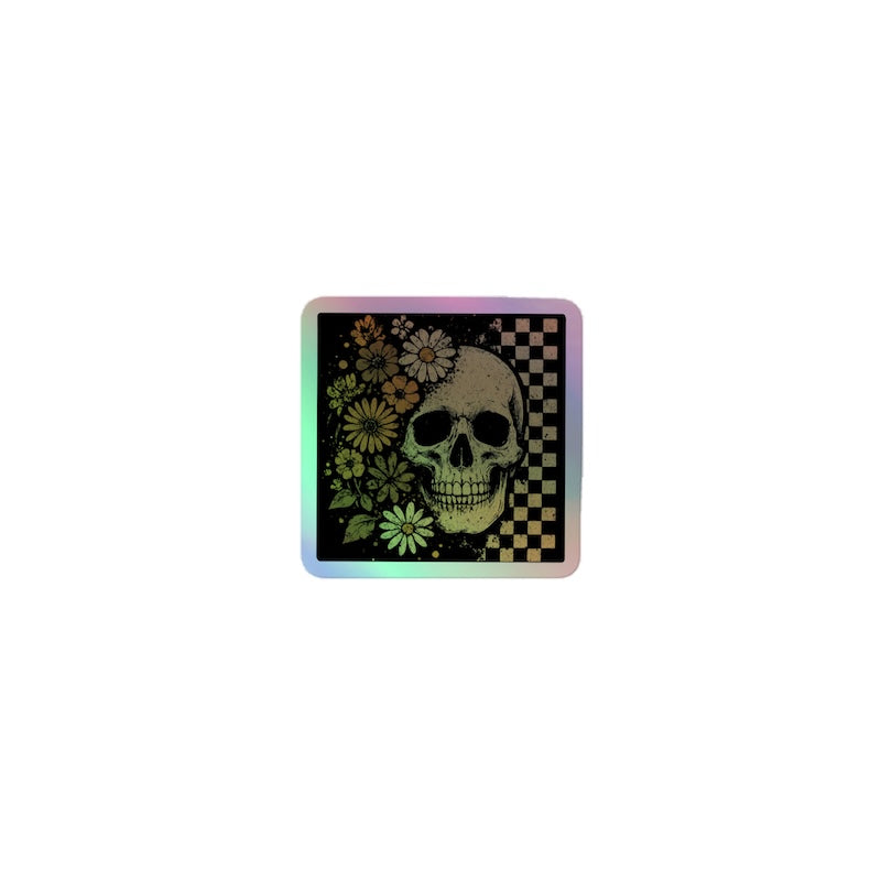 Square coaster with a skull and floral design on a checkered background