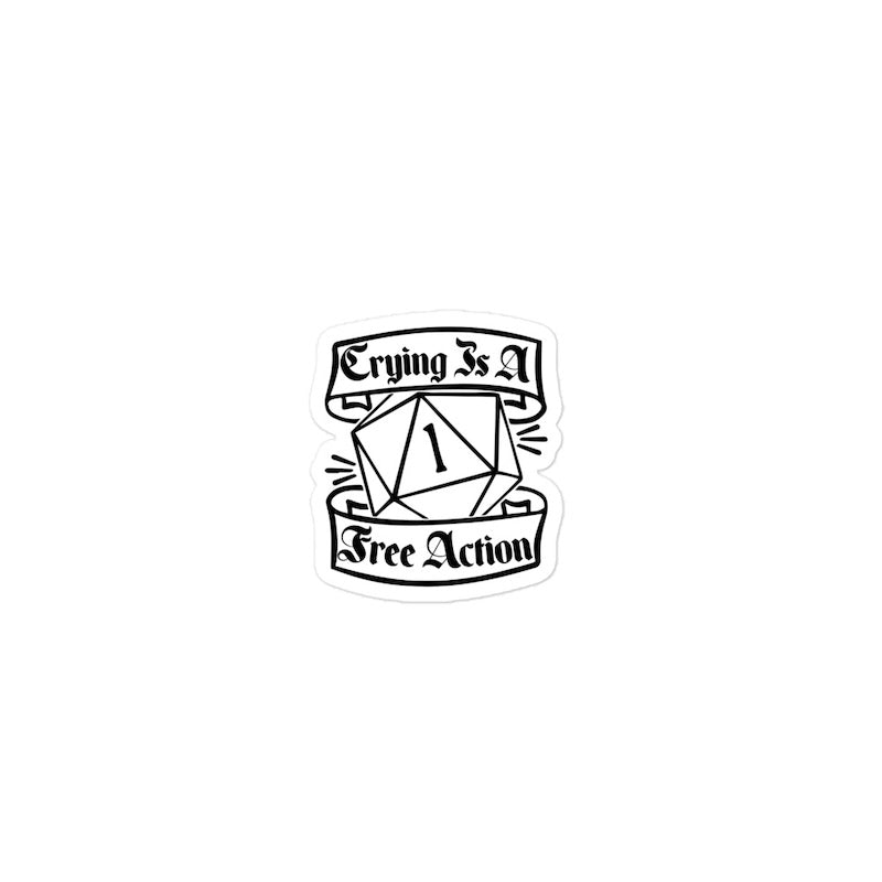 Sticker with text 'Crying is a Free Action' and a die symbol on a white background