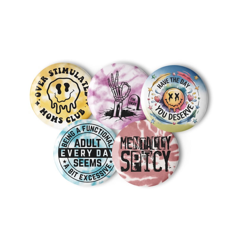 Set of five colorful buttons with humorous text and graphics on a white background