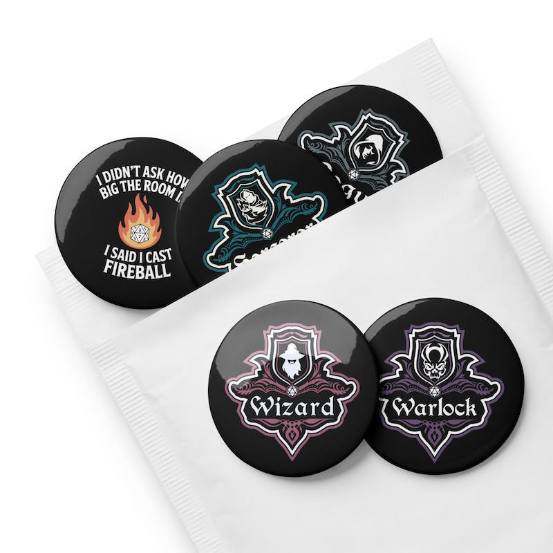 Set of black buttons with fantasy-themed designs and text on a white background
