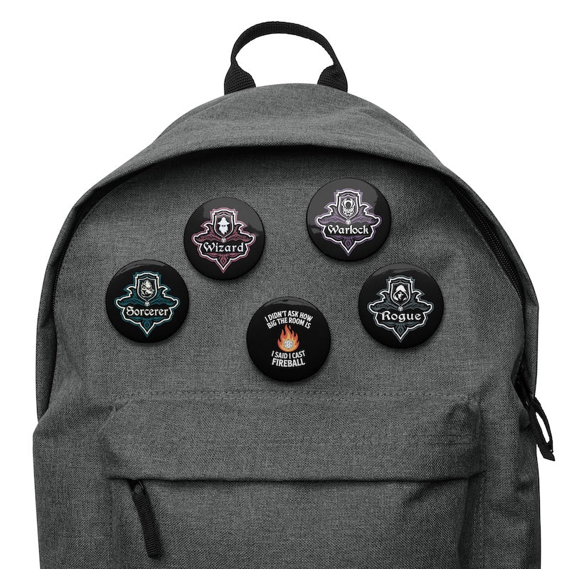 Gray backpack with character class patches on a white background