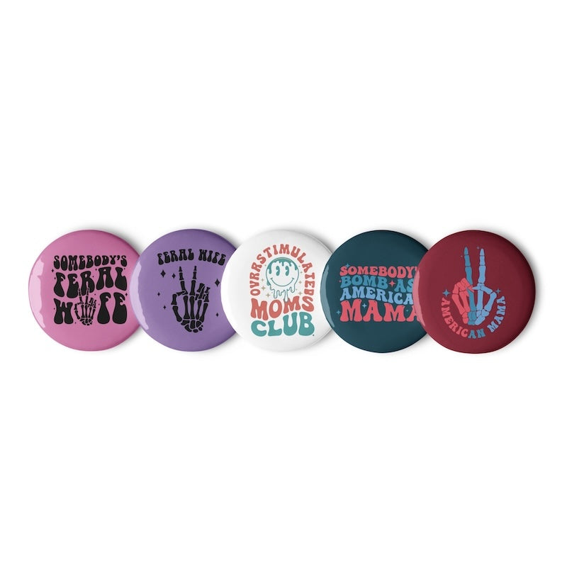 Five colorful buttons with various designs and text on a white background