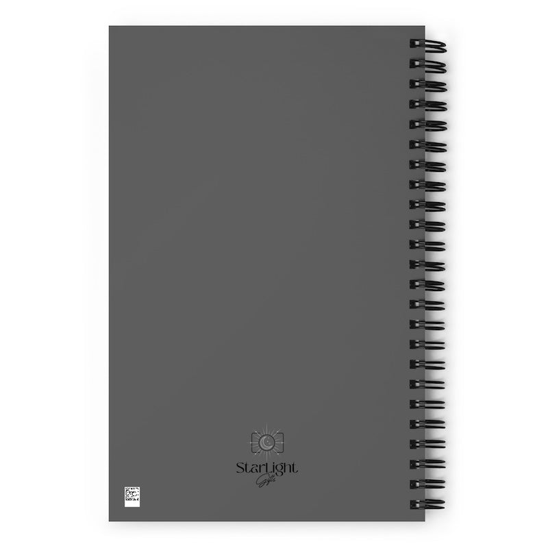 Gray notebook with spiral binding on a white background