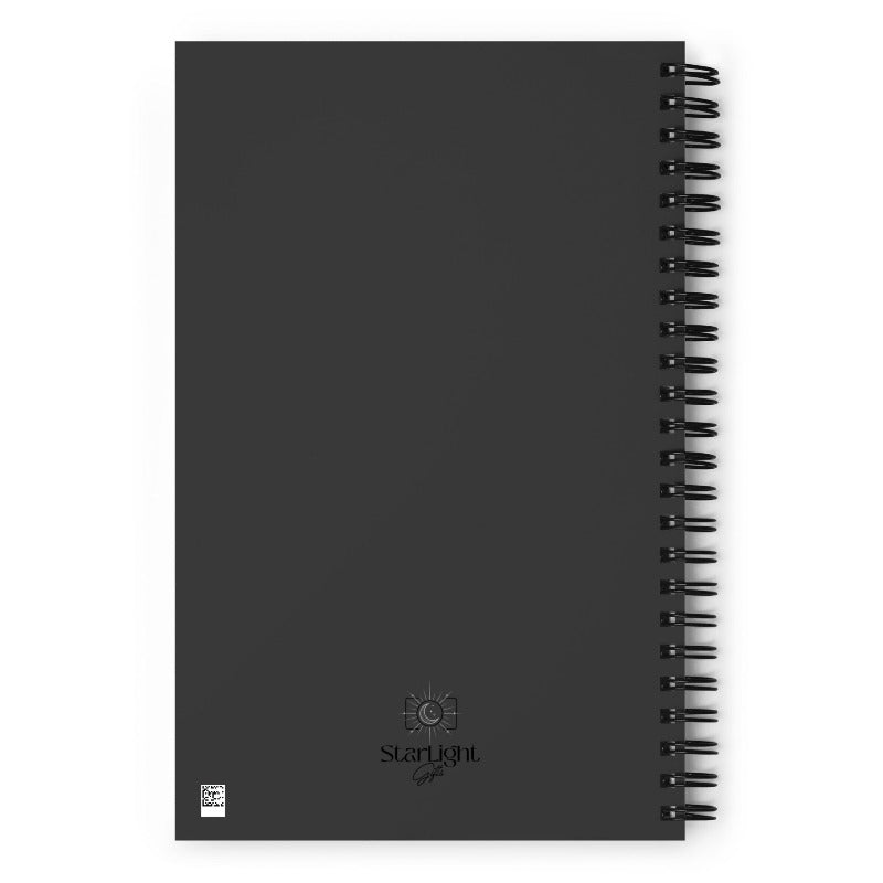 Black spiral-bound notebook with a visible brand logo on a white background