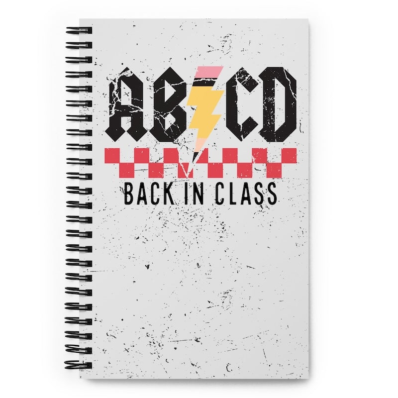 Notebook with 'ABCD Back in Class' design on a white background