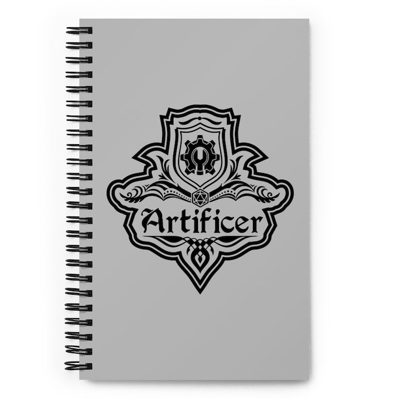 Notebook with 'Artificer' emblem on a gray background