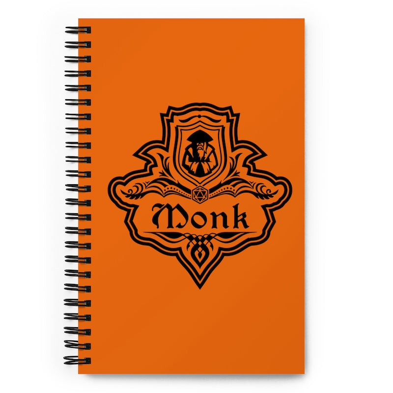 Notebook with 'Monk' design on an orange background
