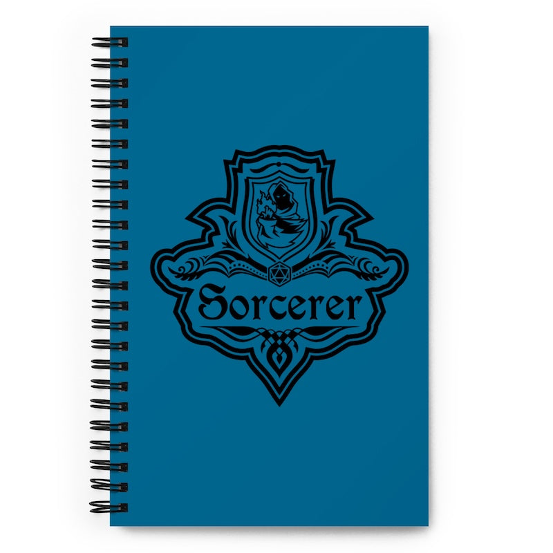 Blue notebook with 'Sorcerer' design on a white background