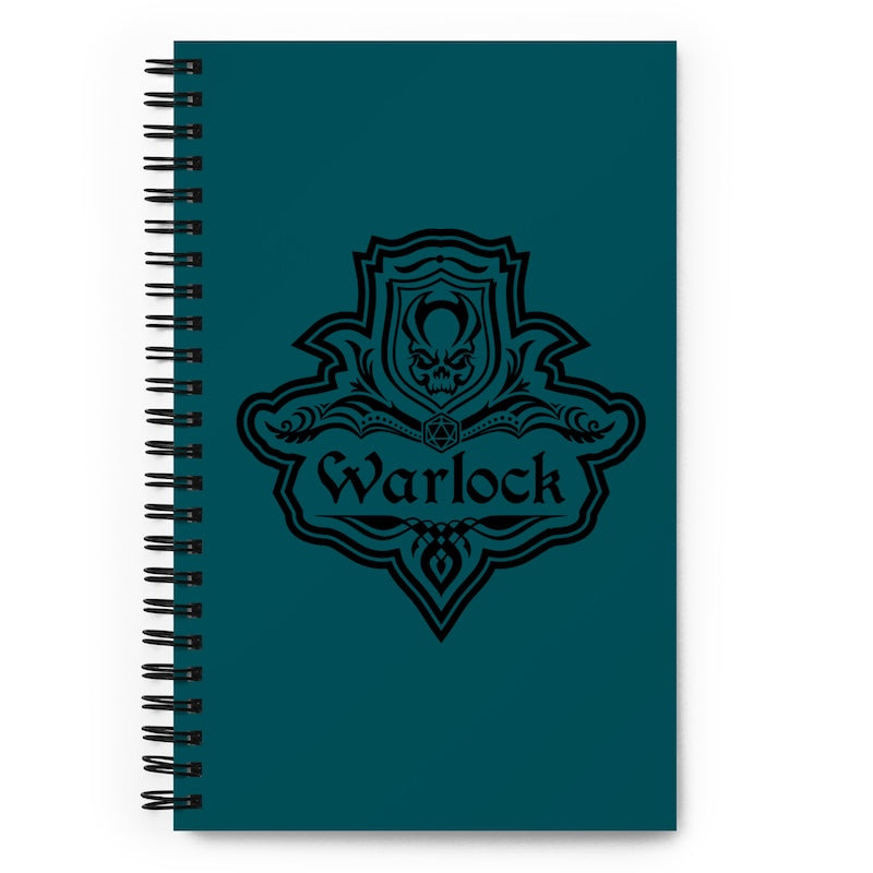 Notebook with 'Warlock' design on a teal background