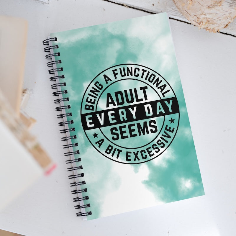 Notebook with a humorous quote on a light background