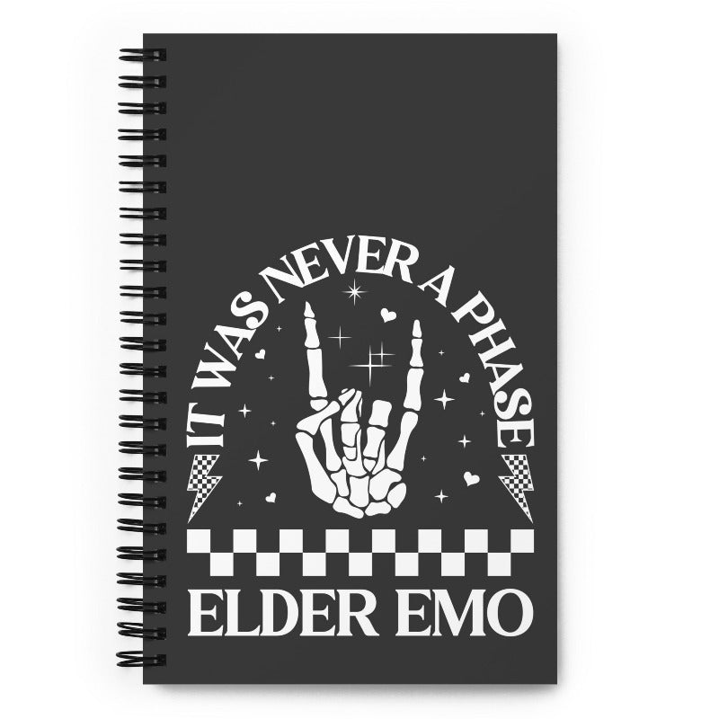 Black notebook with white text and design on a white background