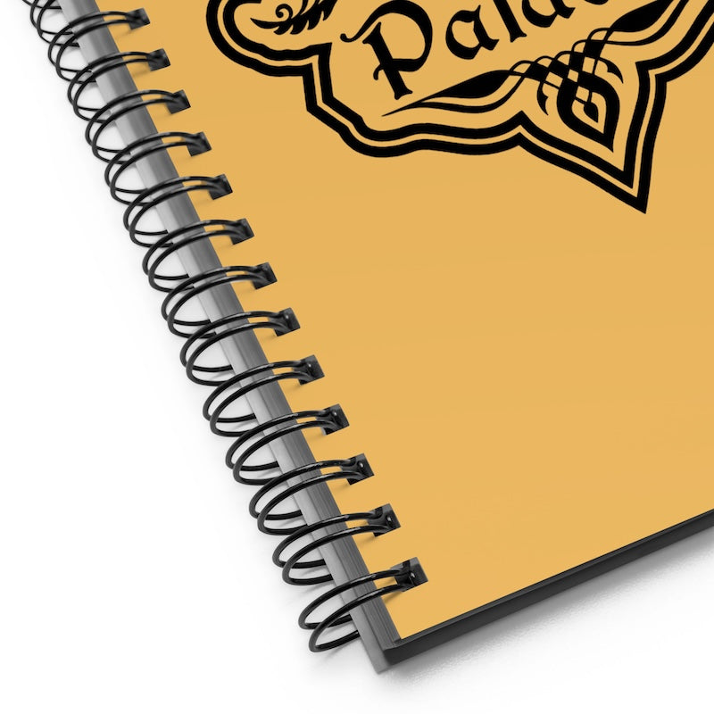 Spiral-bound notebook with a brand logo on a white background
