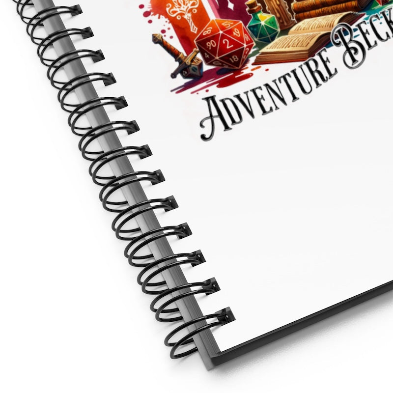 Spiral-bound notebook with 'Adventure Book' design on a white background