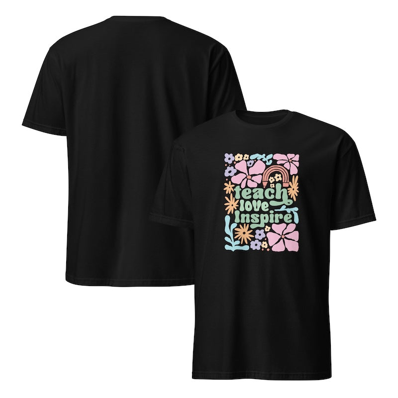 Black t-shirt with colorful 'teach love inspire' design on a white background