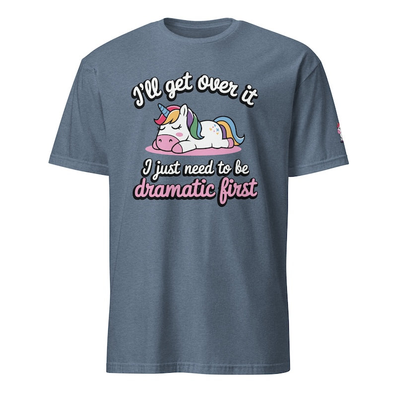 Blue t-shirt with a unicorn graphic and humorous text on a white background