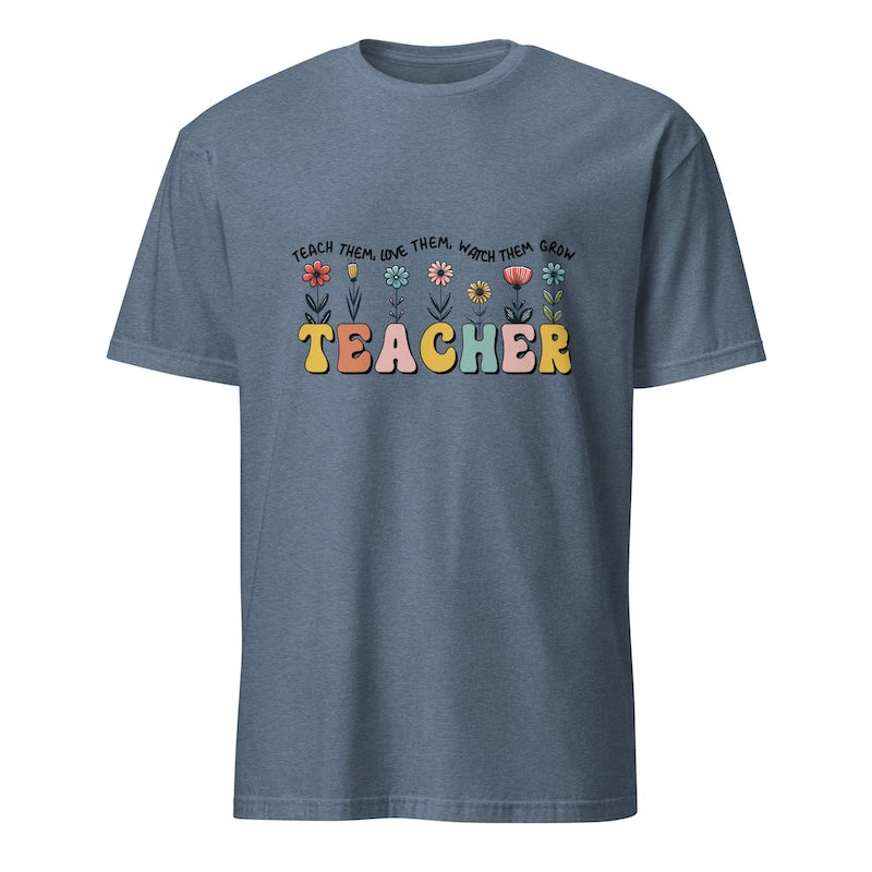 Blue t-shirt with colorful 'TEACHER' text and flowers on a white background
