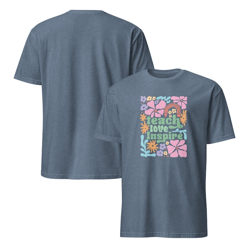 Blue t-shirt with colorful 'Teach Love Inspire' design on a white background
