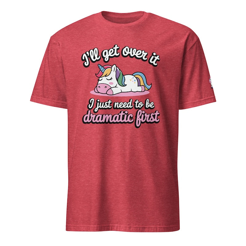 Red t-shirt with a unicorn graphic and humorous text on a white background