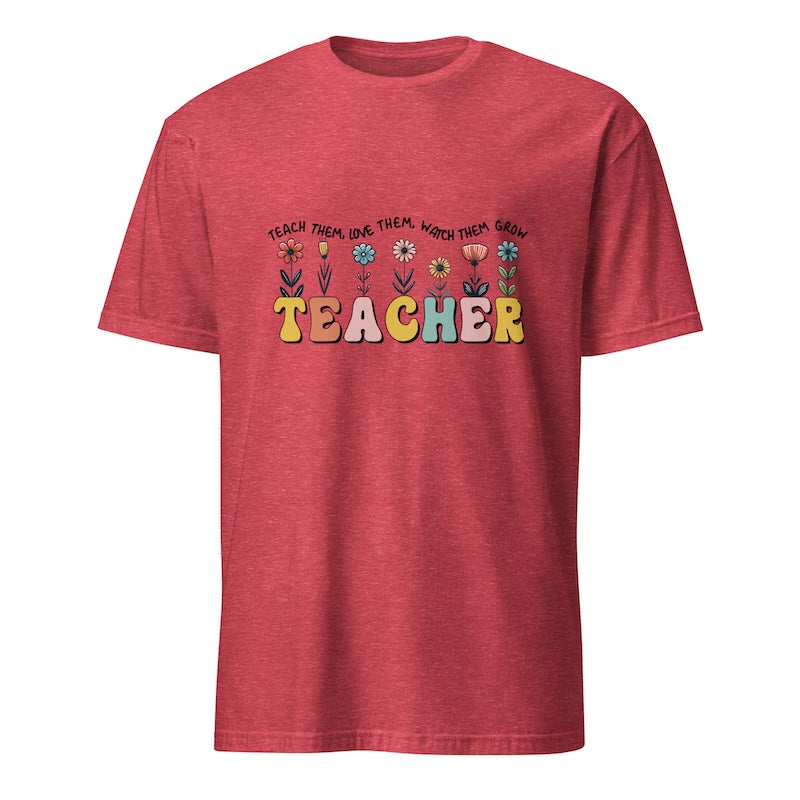 Red t-shirt with colorful 'TEACHER' text and floral designs on a white background