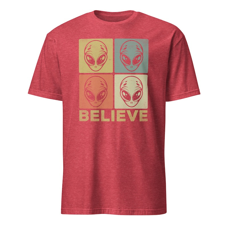 Red t-shirt with alien head graphic and 'BELIEVE' text on a white background