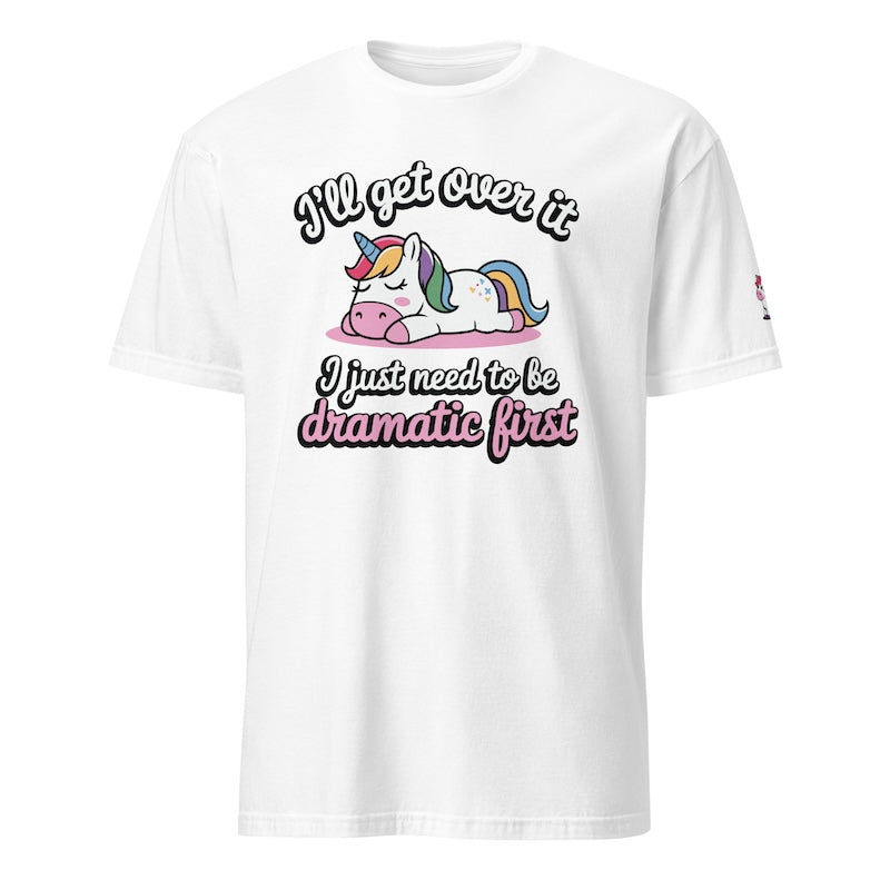 White t-shirt with a unicorn graphic and humorous text on a white background