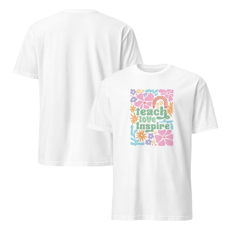 White t-shirt with colorful 'teach love inspire' design on a white background