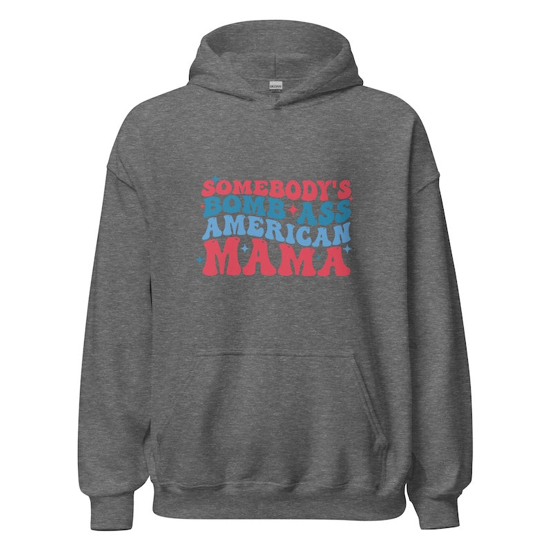 Gray hoodie with colorful text 'SOMEBODY'S BOMB ASS AMERICAN MAMA' on a white background