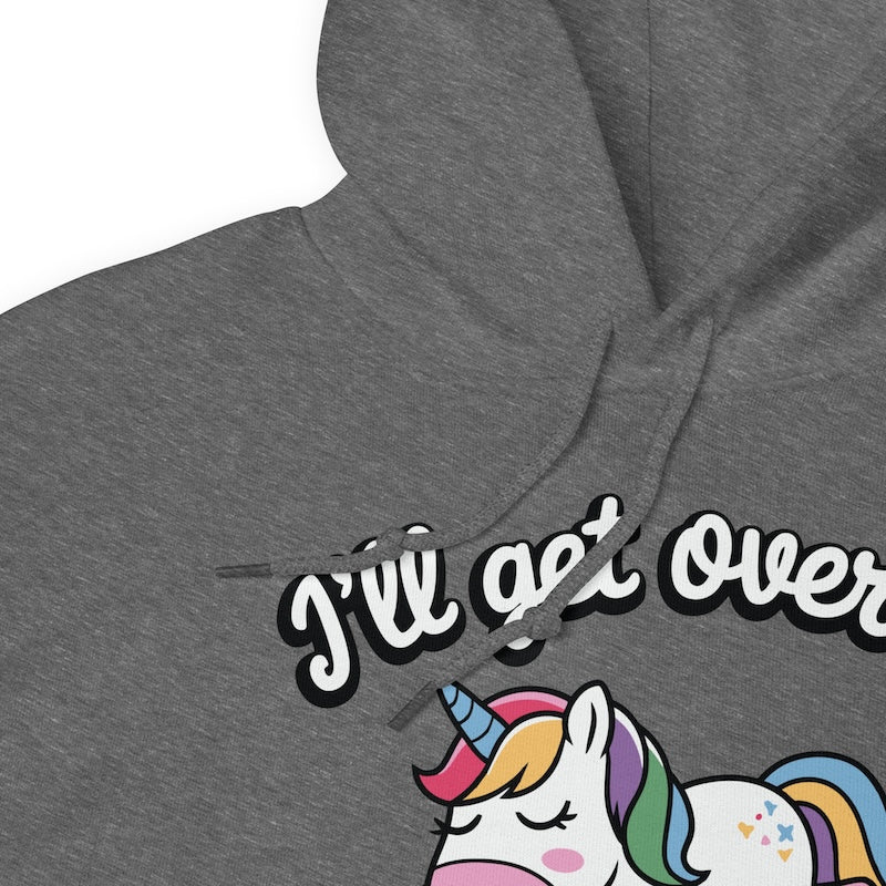 Gray hoodie with a unicorn graphic and text 'I'll get over it' on a white background