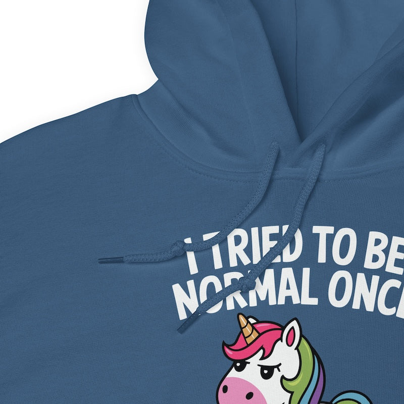 Blue hoodie with a unicorn graphic and text on a white background