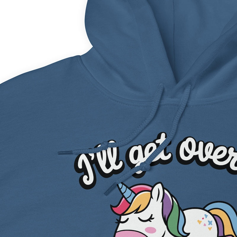 Blue hoodie with a unicorn graphic and text 'I'll get over' on a white background