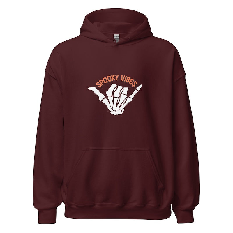 Maroon hoodie with 'Spooky Vibes' design on a white background