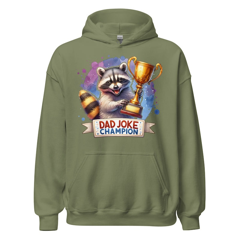 Green hoodie with a raccoon holding a trophy and 'Dad Joke Champion' text on a white background