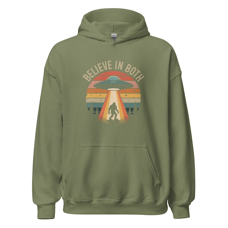 Green hoodie with UFO and Bigfoot graphic and 'BELIEVE IN BOTH' text on a white background