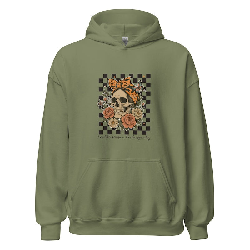 Green hoodie with a skull and floral design on a white background
