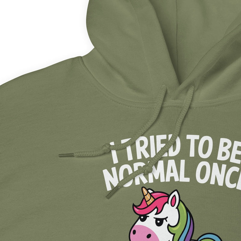 Green hoodie with a unicorn graphic and text on a white background