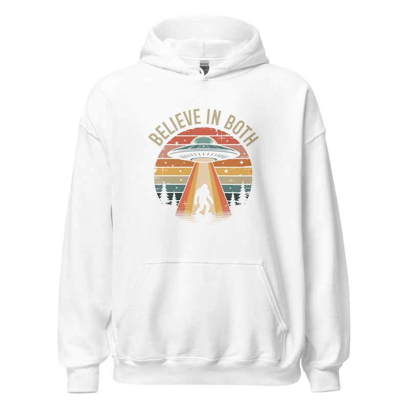 White hoodie with 'Believe in Both' graphic design featuring a UFO and trees on a white background
