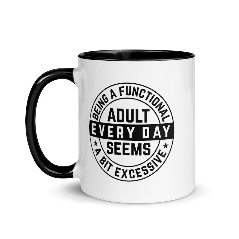 White mug with black handle and text design on a white background