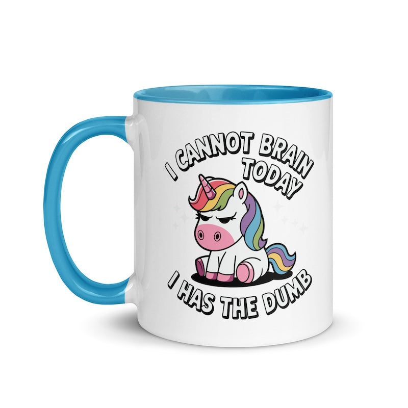 Mug with a unicorn graphic and humorous text on a white background