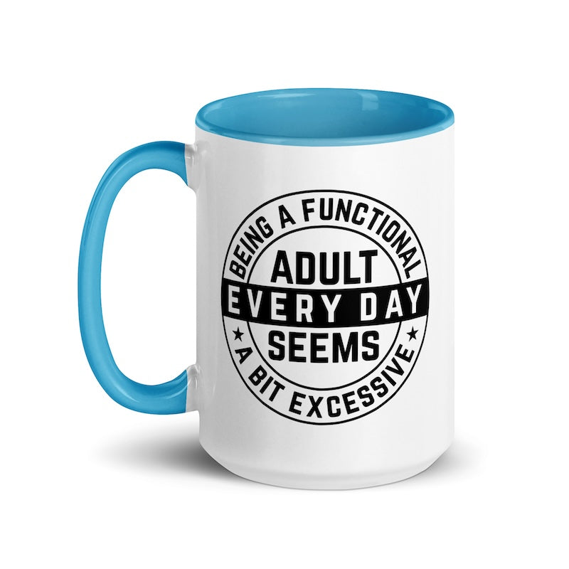 Mug with blue handle and interior, featuring a humorous quote about being an adult on a white background.