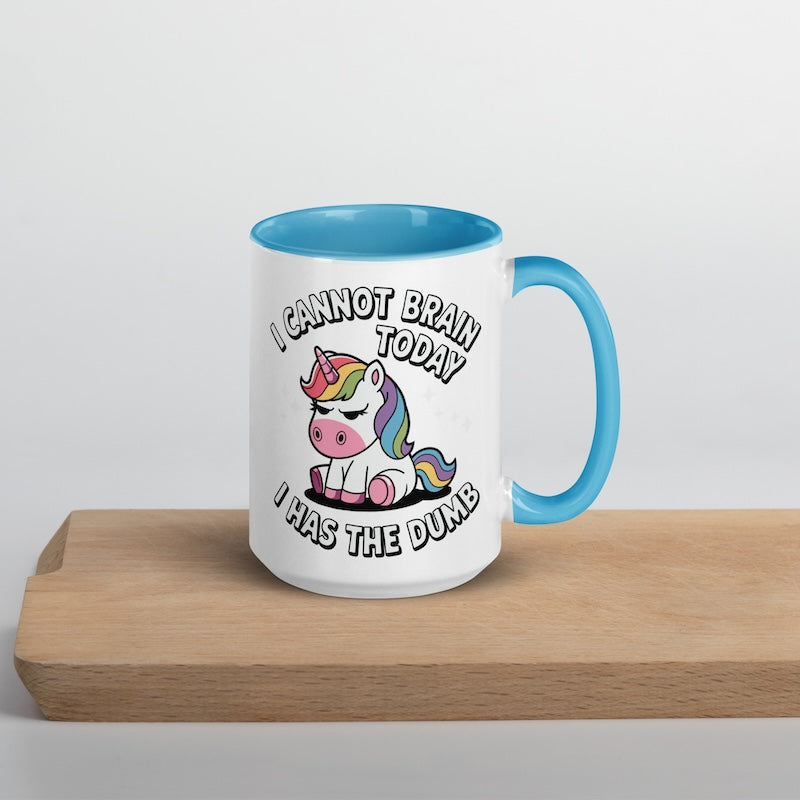 Mug with unicorn design and text on a wooden surface